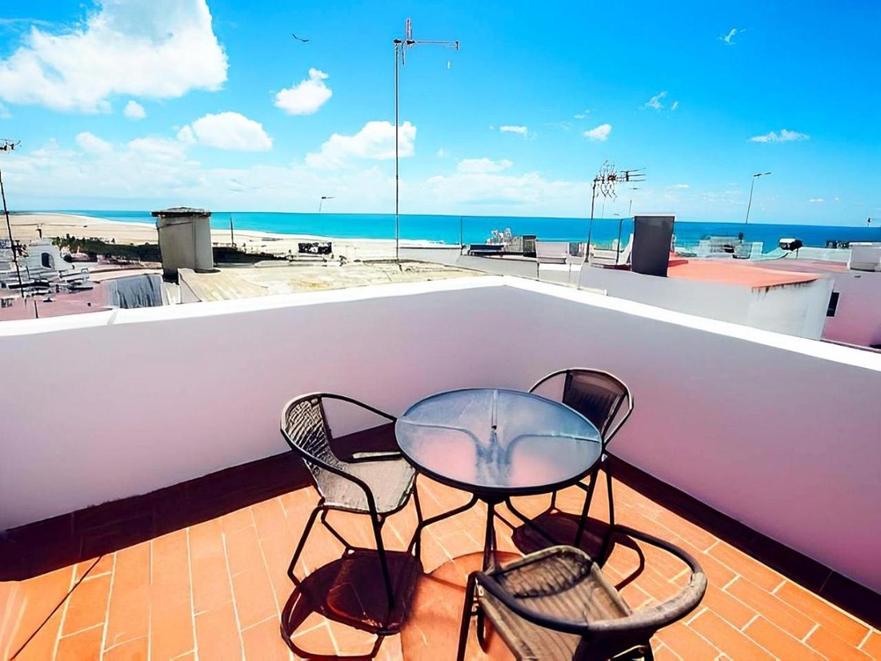 Apartamentos Cerca Del Mar Con Azotea Comunitaria โกนิล เด ลาฟรอนเตรา ภายนอก รูปภาพ